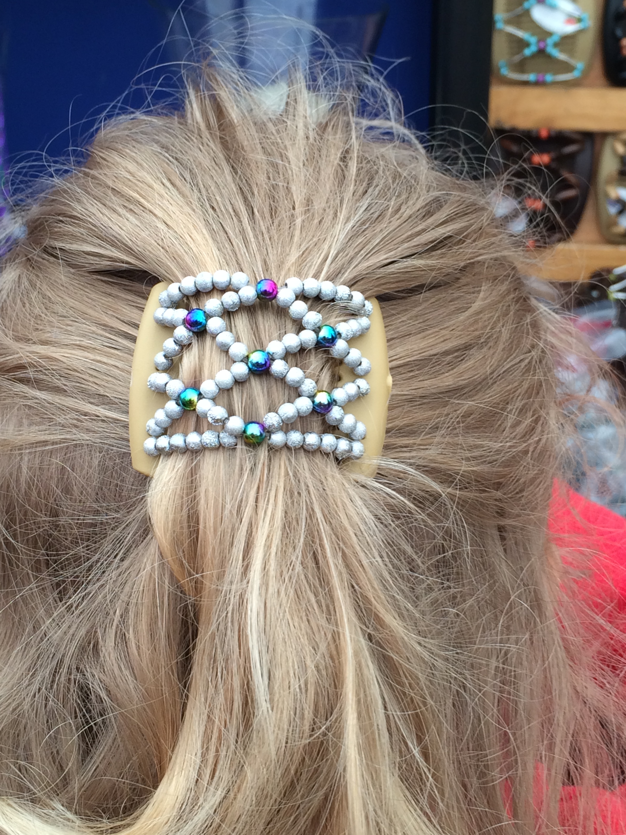 Ladybug hair clip in little girls hair - half up